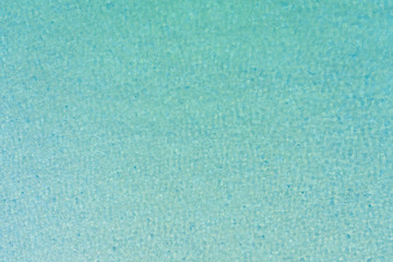 Abstract surface water waves in the sea with reflections. Natural the texture for background