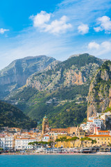 Fototapeta na wymiar Amalfi at sunny day. Beautiful Italian seaside town on coastline of Tyrrhenian Sea