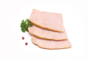 cut pieces of ham near parsley leaves and pepper red peas