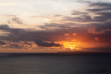 Naklejka na ściany i meble beautiful sunset on the sea