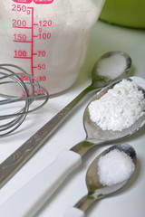 Ingredients and tools for making marshmallow sandwiches lie on the table.
