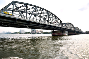 Fototapeta premium bridge over the river for comfortable communication between Bangkok big city to Thon-buri area.