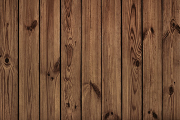 old wooden texture. a wall of vertical pine planks with a characteristic wooden pattern and knots