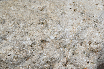 Rock texture and surface background. Cracked and weathered natural stone background.