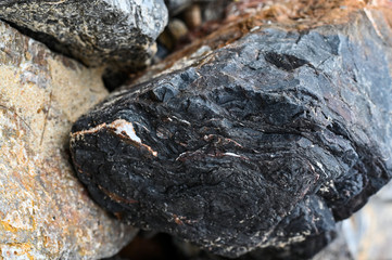 Rock texture and surface background. Cracked and weathered natural stone background.