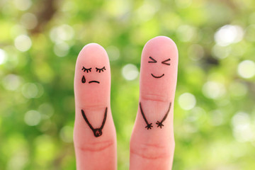 Fingers art of couple. Woman cries, man laughs.