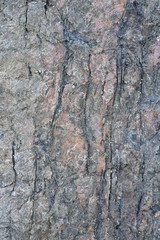 Rock texture and surface background. Cracked and weathered natural stone background.