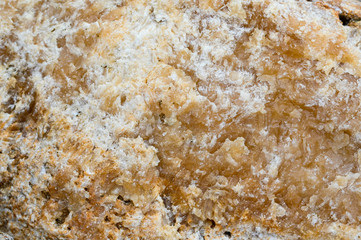 Rock texture and surface background. Cracked and weathered natural stone background.
