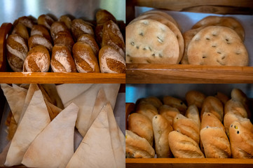 Various types of fresh baked bread pastries on display