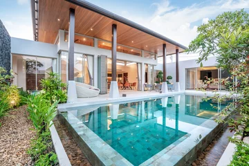 Foto op Plexiglas home or house building Exterior and interior design showing tropical pool villa with green garden and bedroom © Stock PK