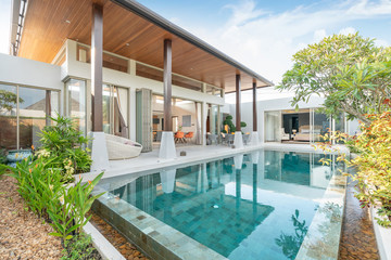 Obraz na płótnie Canvas home or house building Exterior and interior design showing tropical pool villa with green garden