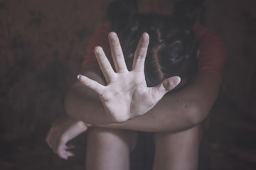 Stop violence and rape concept,concept photo of sexual assault,traumatized young girl