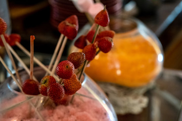 Strawberries on stick for chocolate fondue skewer