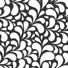 Seamless abstract pattern with white drops or petals on black background.