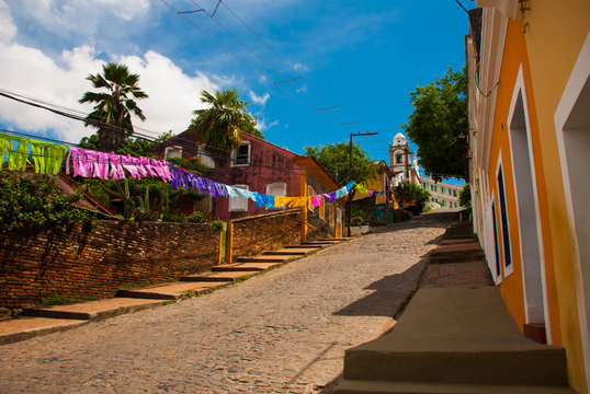 Olinda, Pernambuco, Brazil: The historic streets of Olinda in Pernambuco, Brazil with its cobblestones and buildings dated from the 17th century when Brazil was a Portuguese colony.