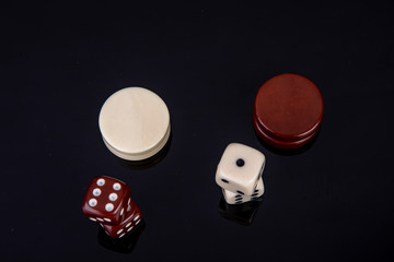 dice and backgammon stone top view