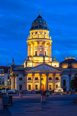 Fototapeta premium New Church (Deutscher Dom or Neue Kirche) on Gendarmenmarkt square at night, Berlin, Germany
