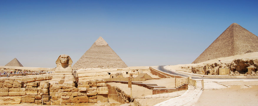 Panorama view of Giza in Cairo, the great pyramyd of Cheops, the pyramids of Kefren and Micerinos, the Sphinx