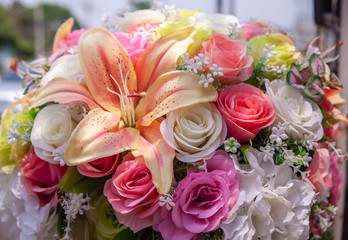 Colorful plastic flower bouquet for background