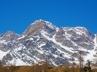 View of Monte Rosa on a sunny day near the village of Macugnaga, Italy - April 2019