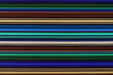 Background texture of fabric in a color longitudinal strip