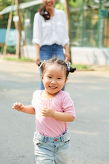 Cute running little girl