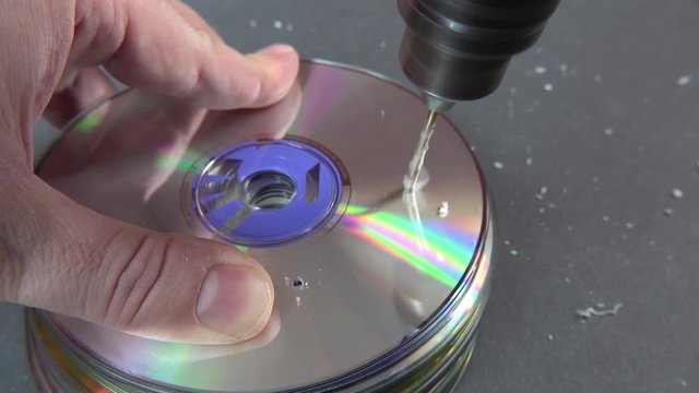 Concept of deleting big data by drilling a hole into the DVD RAM