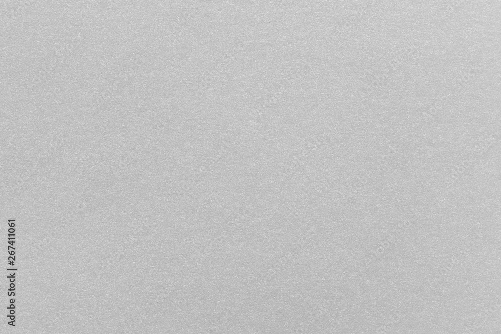 Wall mural abstract grey glossy paper texture background or backdrop. empty gray cardboard or shiny paperboard 