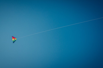 Kite flying in blue sky