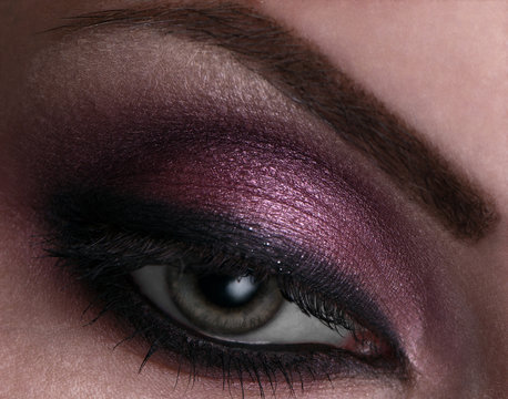  Bright and attractive eye makeup. Close-up.