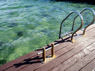 ladder descending to the water near the sea
