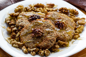 Oatmeal cookies with honey and walnuts. Menu for a bakery. Close-up