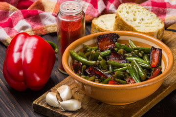 Fried green beans with red pepper, bread, garlic. Vegetarian food.
