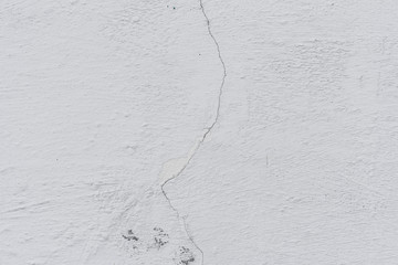 Texture, wall, concrete, it can be used as a background. Wall fragment with scratches and cracks