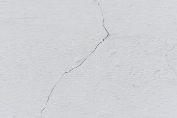 Texture, wall, concrete, it can be used as a background. Wall fragment with scratches and cracks