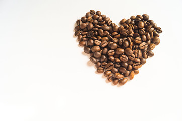 Pattern with coffee beans white background on black background for decoration design. White isolated background. Organic ingredient. Morning coffee. Healthy breakfast. Breakfast beverage.