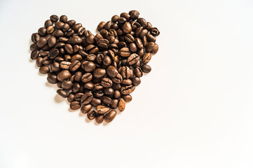 Pattern with coffee beans white background on black background for decoration design. White isolated background. Organic ingredient. Morning coffee. Healthy breakfast. Breakfast beverage.