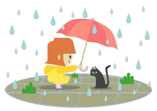 雨の日にレインコートを着た女の子が猫に傘を差し出しているところ