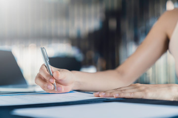 business investor woman success deal contract with paper sign close up hand hold pen sign contract
