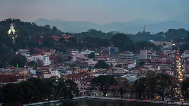 sry lanka timelapse of kandy city of temple view from a hill at sunset with dramatic cloudy sky and traffic