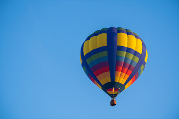 Colorful of balloon on blue sky with copy space