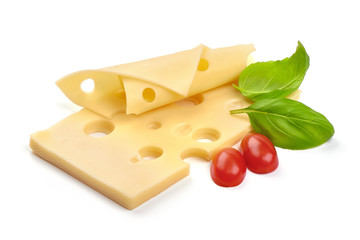 Swiss cheese slices with basil and tomatoes, close-up, isolated on white background