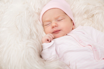 Sleeping Baby, New Born Kid Sleep in Fur, Beautiful Newborn Infant close up Portrait, One month old