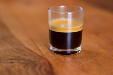 cup of coffee on a wooden table