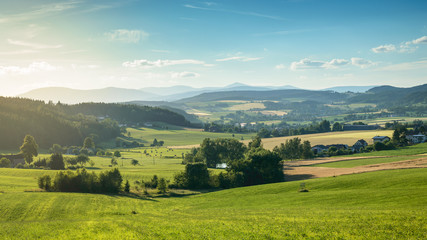Fototapeta na wymiar Mountain landscape, green valley on a sunny summer day.