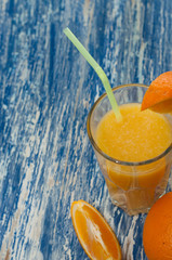 Fresh orange cocktail in glass, on the left there is space for copy space