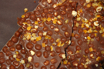 milk chocolate bricks with nuts for background