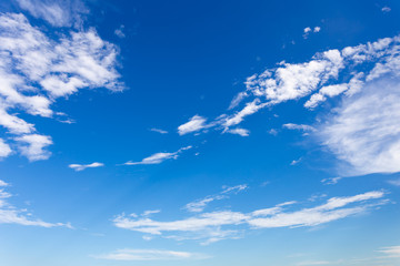 Naklejka na ściany i meble Blue sky background with beautiful clouds