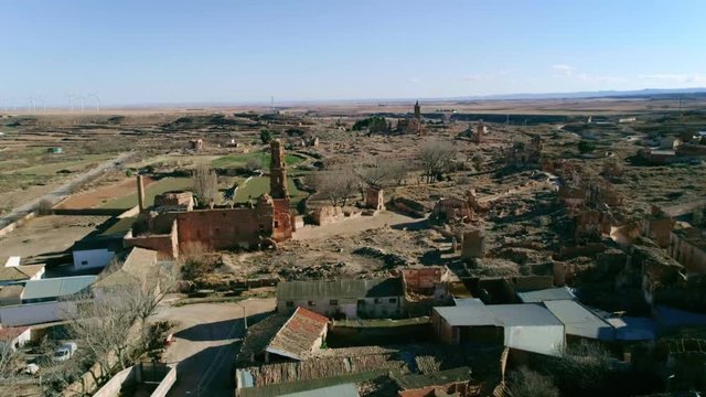 Aerial drone shot of ruins of old castle or church cathedral in rural spanish town, debris of civil war or aged ancient architecture. Discover and travel the path less travelled, tourism