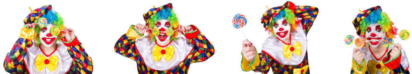 Fototapeta na wymiar Funny male clown with lollipop 